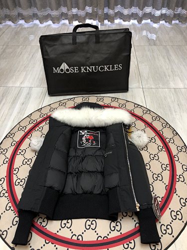 Moose Knuckles Black Hooded Bomber Jacket with Plush Pom-Poms