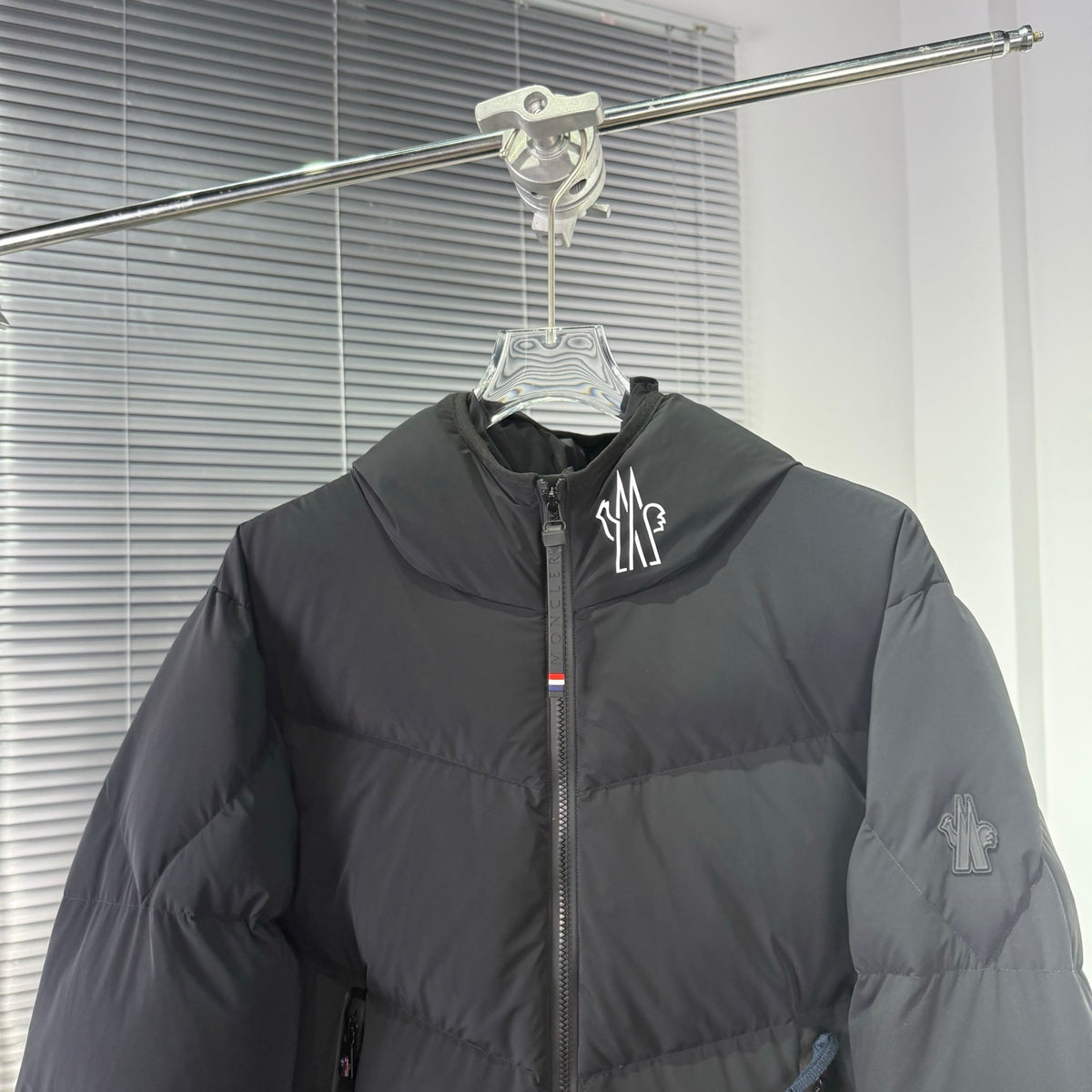 Moncler Black Hooded Puffer Jacket with Chevron Quilting