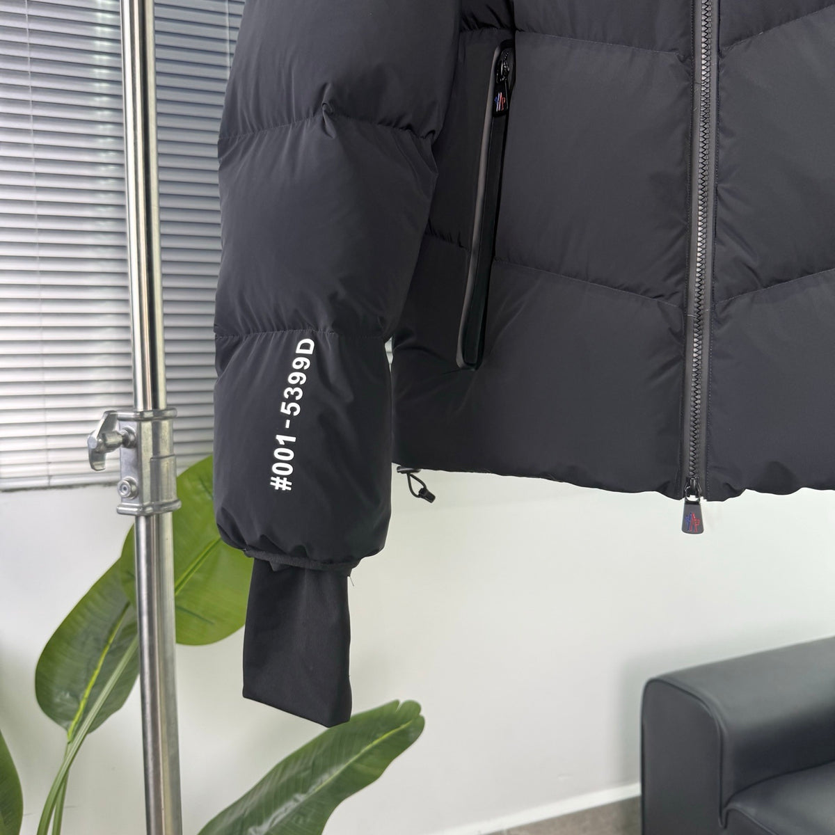 Moncler Black Hooded Puffer Jacket with Chevron Quilting