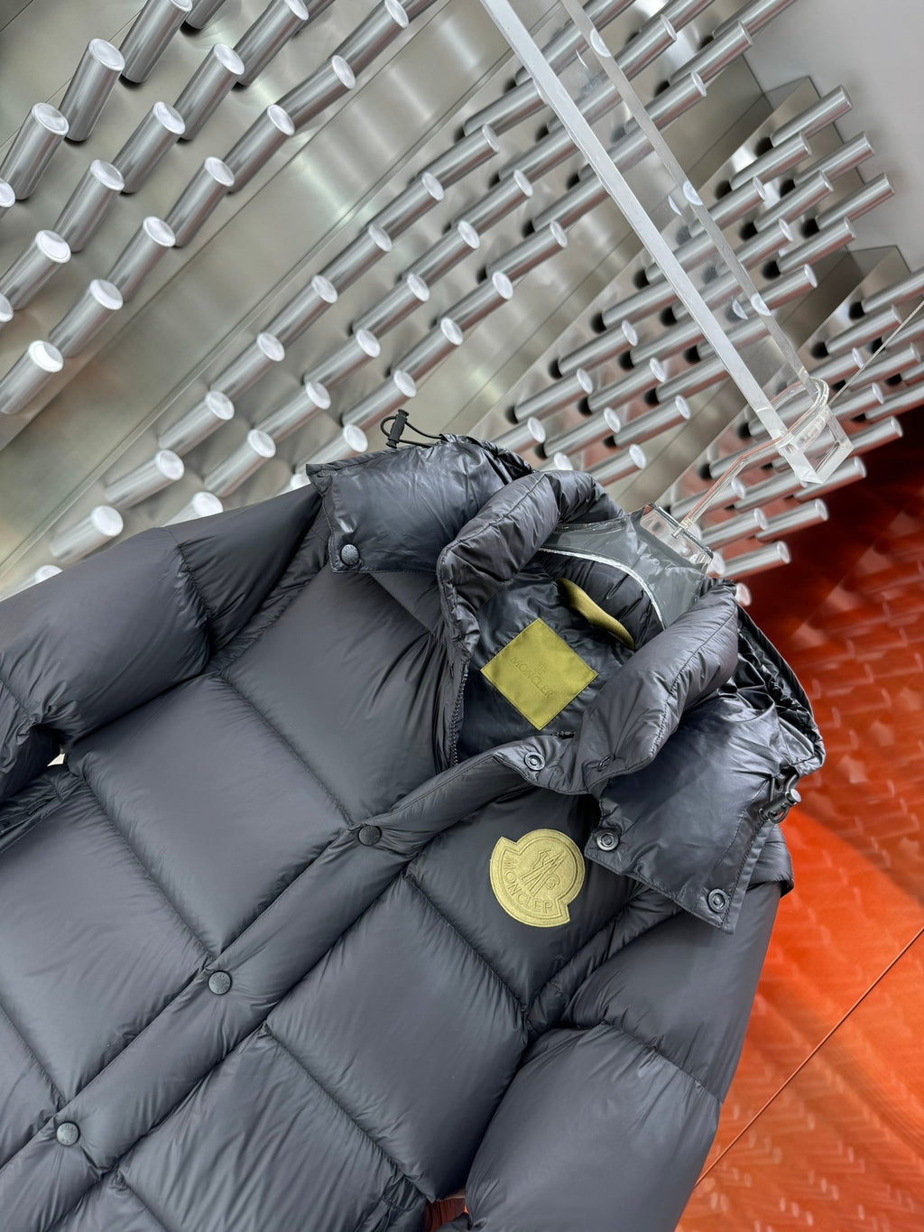 Moncler Dark Gray Hooded Puffer Jacket with Yellow Chest Emblem
