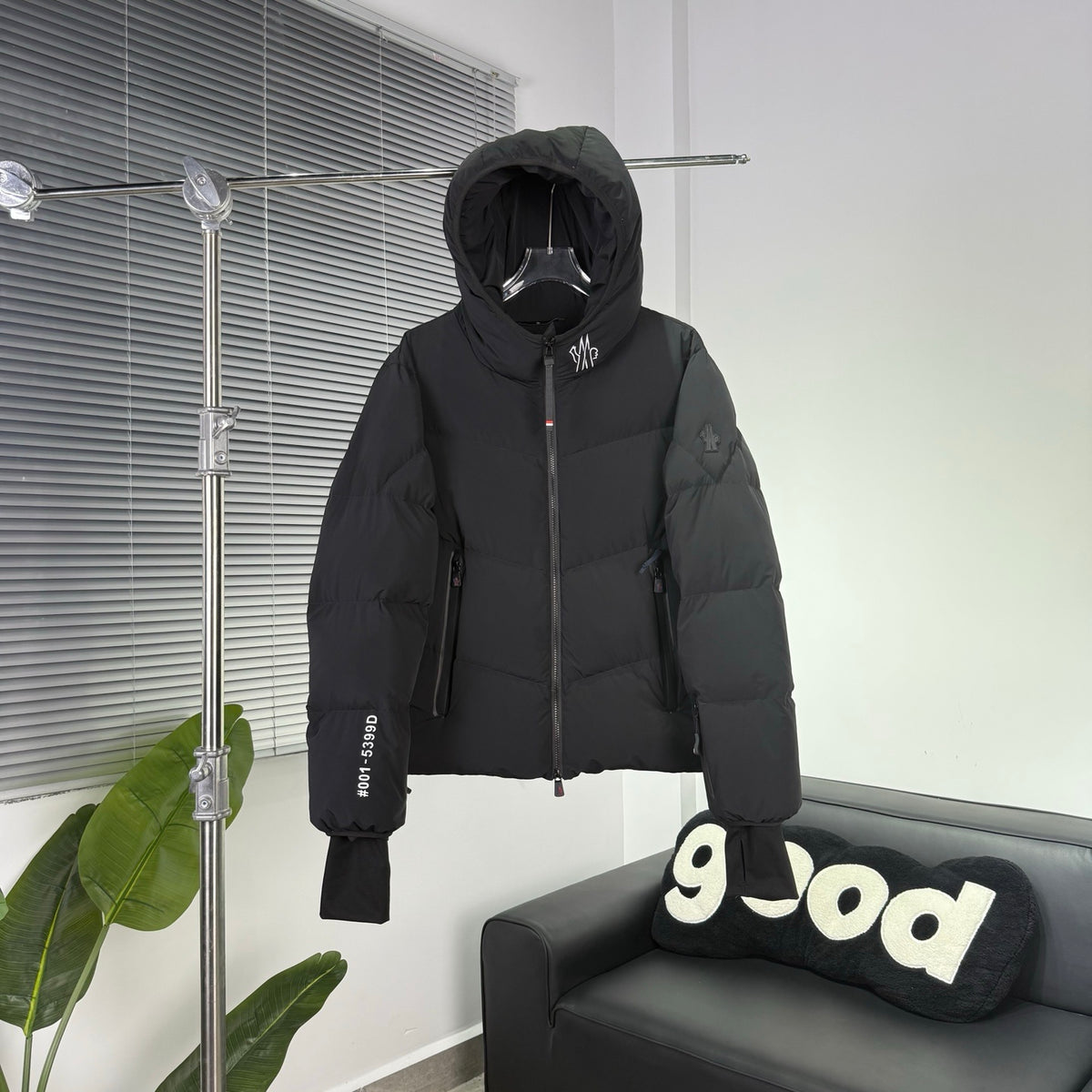 Moncler Black Hooded Puffer Jacket with Chevron Quilting